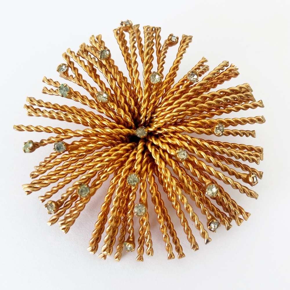 Vintage signed Ciro Goldtone starburst Brooch with Rhinestones